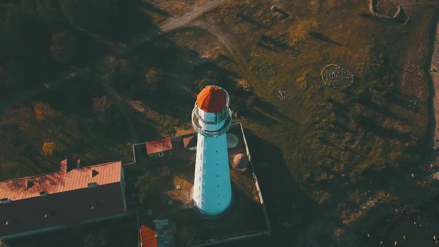 Lighthouse on small island in Baltic sea filmed by drone