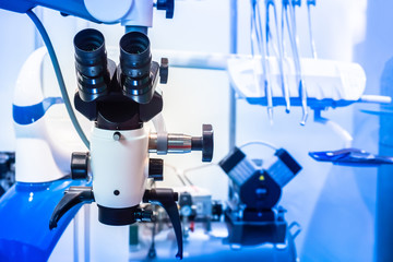 Dental treatment. Microscope at the dentist's chair. Dentist office. Stamotology equipment.