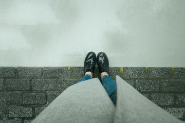 The view from the top of the foot in the Shoe standing on the crossroads of black and white surfaces