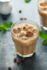 iced latte coffee in a glass with cold milk. Summer drink