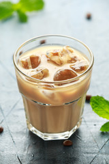 iced latte coffee in a glass with cold milk. Summer drink