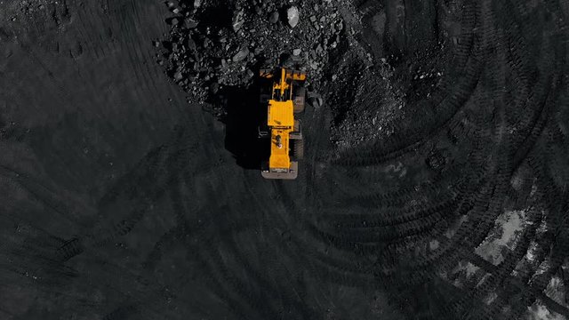 Open pit mine, extractive industry for coal, top view aerial drone