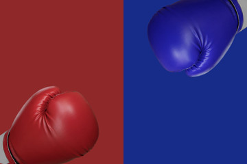 boxing glove in red and blue corner for fight and comparing the products