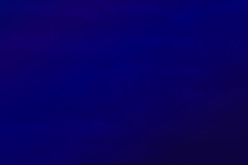 Navy blue background texture wall. Dark blue cement concrete stucco. painted cement Surface design.Gradient,consisting,paper.