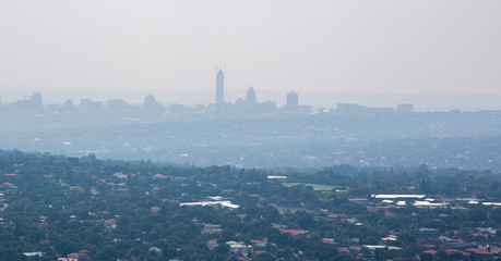 Fototapeta na wymiar Air pollution in Johannesburg, South Africa.