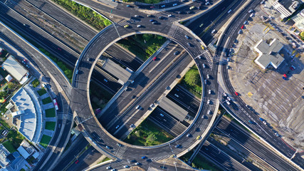 Aerial drone photo of multilevel highway junction urban ring crossing road during rush hour