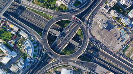 Aerial drone photo of multilevel highway junction urban ring crossing road during rush hour