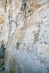 Fototapeta premium Man passing along via ferrata.