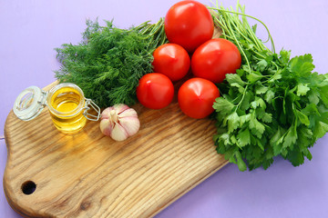 Naklejka na ściany i meble fresh vegetables on a cutting board. the concept of health