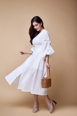 Pretty beautiful sexy elegance woman skin tan body fashion model glamor pose wear trend dress...