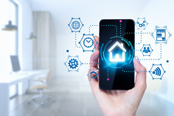 Woman hand with phone smart home interface in room