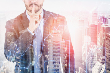 Businessman protecting secrets, trading concept