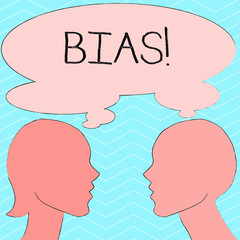 Writing note showing Bias. Business concept for inclination or prejudice for or against one demonstrating group Silhouette Sideview Profile of Man and Woman Thought Bubble