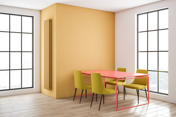 Yellow and white dining room corner