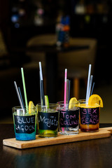 Cocktail Drinks On a Wooden Board