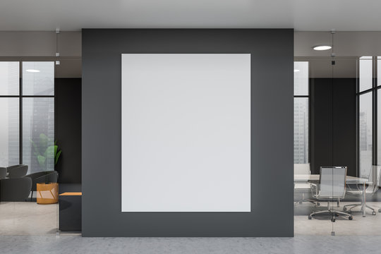 Vertical poster in gray office interior