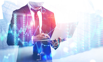 Man with laptop in server room, digital interface
