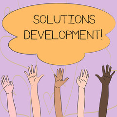 Writing note showing Solutions Development. Business concept for determining the best way of satisfying requirements Multiracial Hands Raising Up Reaching for Colorful Big Cloud