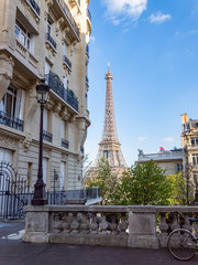 Fototapeta na wymiar Paris, France: View of the Eiffel Tower from the Avenue de Camoens