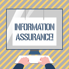 Writing note showing Information Assurance. Business concept for the process of protecting information from being seen Hands on Keyboard Front White Monitor with Screen Protector