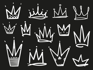 Collection of crowns on black. Hand drawn simple objects. Line art. Black and white illustration. Elements for design