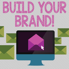 Conceptual hand writing showing Build Your Brand. Concept meaning creates or improves customers knowledge and opinions of product Open Envelope inside Computer Letter Casing Surrounds the PC