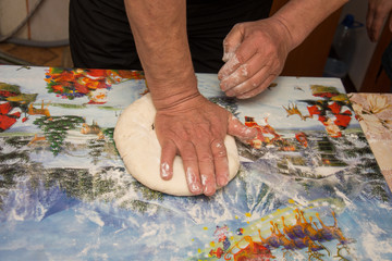 Preparation of pie plum Palanet ,plum pie), traditional pie from Romania, Bistrita,Milas