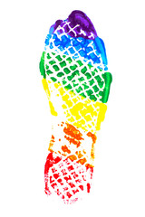 sign of sexual minority equality: a footprint painted in the colors of the flag of the LGBT community, isolated on white. short focus