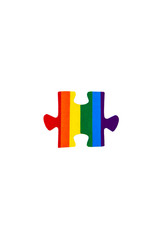 LGBT badge: rainbow flag of sexual minorities depicted in the shape of a puzzle, isolated on white