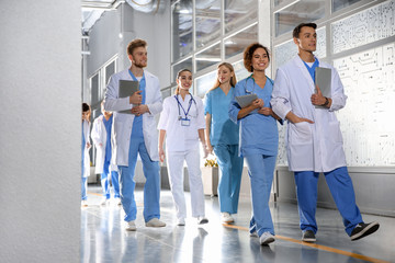 Group of medical students in college hallway