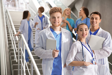 Group of medical students in college hallway