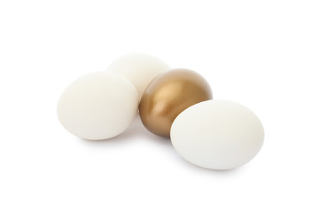 Golden egg among ordinary ones on white background