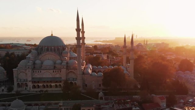 Istanbul aerial cityscape, S&uuml;leymaniye Mosque at color full sunset, Turkey