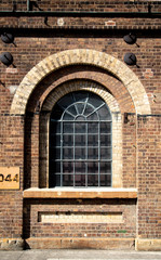 Fototapeta na wymiar window in brick wall