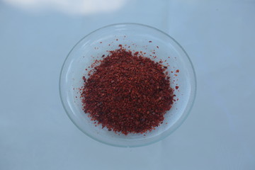 red pepper in a spoon