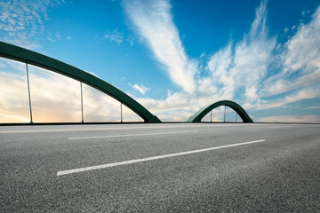Empty asphalt road ground and blue sky with white clouds