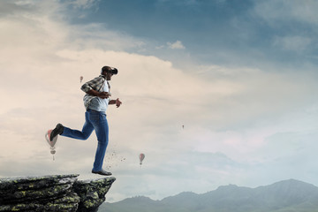Virtual Reality headset on a black male. Mixed media
