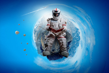Naklejka premium Spaceman and the planet Earth abstract theme