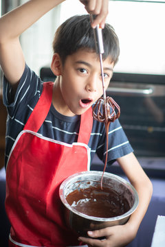 Little Boy Baking Chocolate Cake Homemade