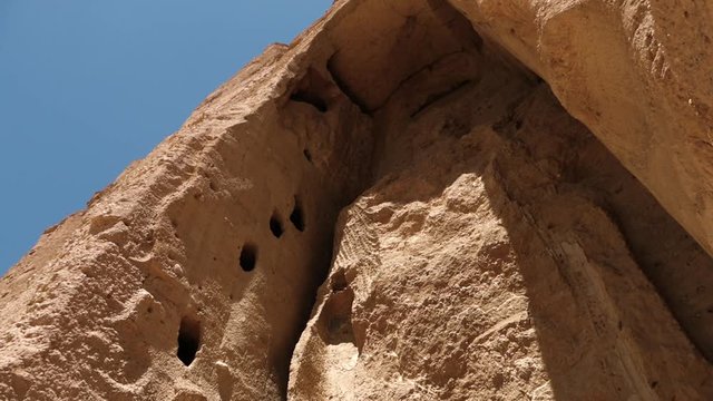 Giant Buddha statues once stood at the site of the Buddhas of Bamyan in Bamyan, Afghanistan. This world heritage site is located in the Bamyan Valley of Afghanistan. Part of this site was destroyed in