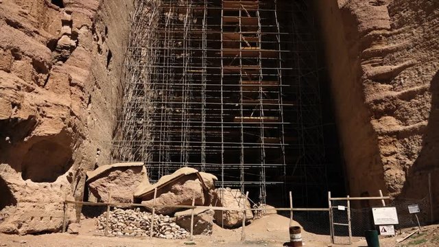  Site of the Buddhas of Bamyan in Bamyan, Afghanistan. This world heritage site is located in the Bamyan Valley of Afghanistan. Part of this site was destroyed in 2001 by the Taliban. Pan Up. Tilt.
