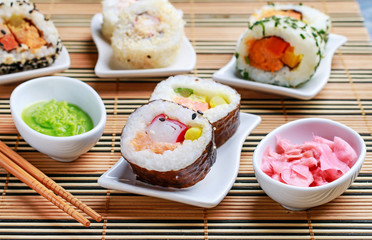 Sushi set on grey stone background.