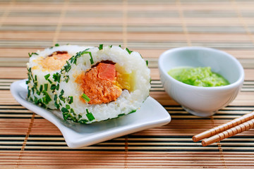 Sushi set on grey stone background.