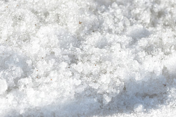 Fototapeta premium Early spring snow background and texture close up