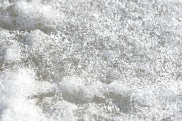 Early spring snow background and texture close up