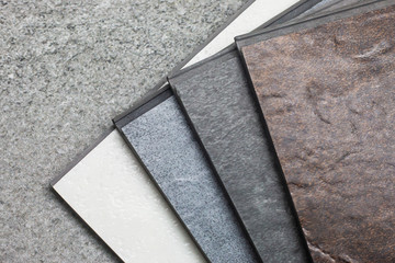 PVC Polymer Vinyl sample for customers to choose the floor design within the copy space .