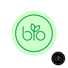 Bio text symbol with green leaves on letter I. Natural product concept round badge.