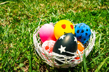 colored Easter eggs on the grass