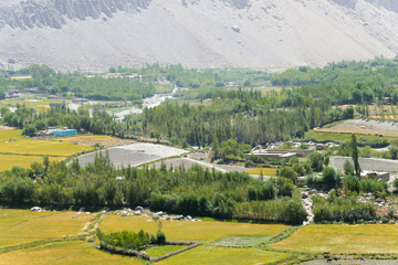Ishkashim, Tajikistan - Aug 23 2018: Afghanistan Village at Wakhan Valley View from Khaakha Fortress in Ishkashim, Gorno-Badakhshan, Tajikistan. It is located in the Tajikistan and Afghanistan border.