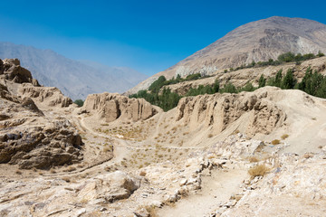 Ishkashim, Tajikistan - Aug 23 2018: Ruins of Khaakha Fortress in the Wakhan Valley in Ishkashim, Gorno-Badakhshan, Tajikistan. It is located in the Tajikistan and Afghanistan border.